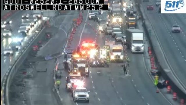 Overturned tractor trailer shuts down all westbound I-285 lanes