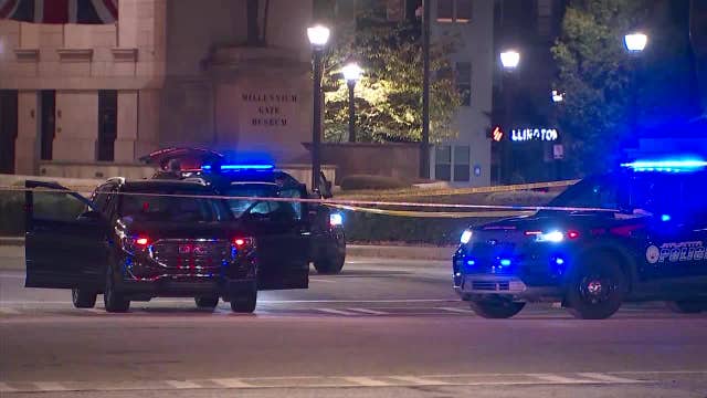 Woman caught in the middle of gun battle at Atlantic Station, police say