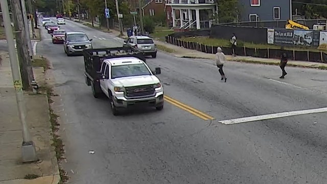 Atlanta shooting suspects seen on video running across busy street, police say