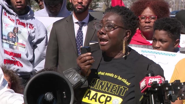 Protesters rally outside Gwinnett County Jail after three incarcerated men die