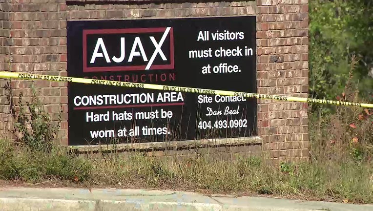 Police tape at an Ajax Construction area where someone discovered a body.