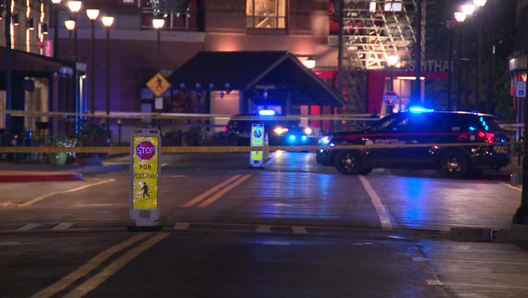 Police investigate a shooting outside the movie theater at Atlantic Station in Atlanta on Oct. 8, 2022.