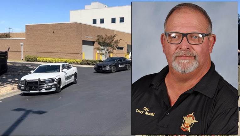 The Cook County Sheriff's Office said Capt. Terry R. Arnold died from a heart attack after responding to a fight between two students at Cook County High School in Adel