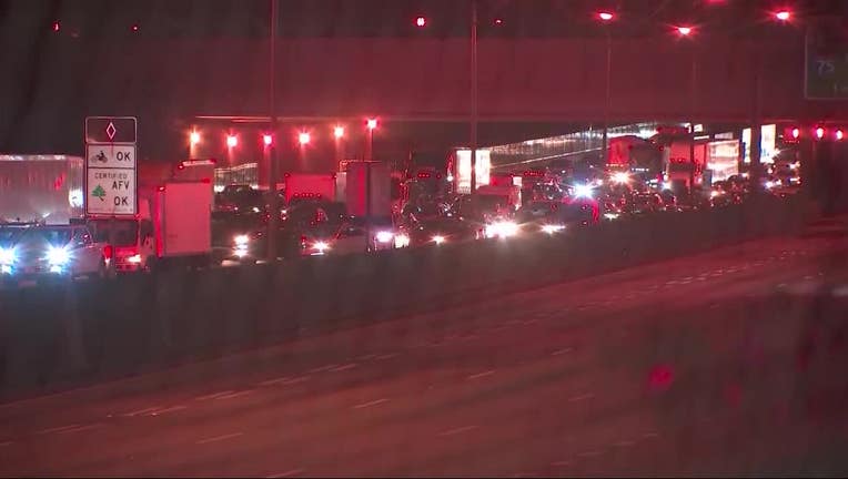 Traffic backs up behind the scene of a deadly crash on the Downtown Connector on Oct. 2, 2022.