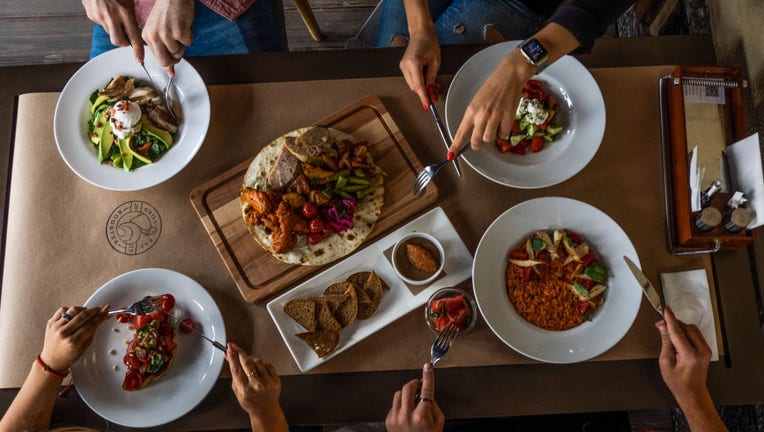 Top view of a group of people at a dinner table