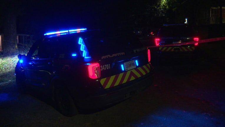 Police investigate a fatal shooting on Victor Circle in NW Atlanta on Oct. 15, 2022.