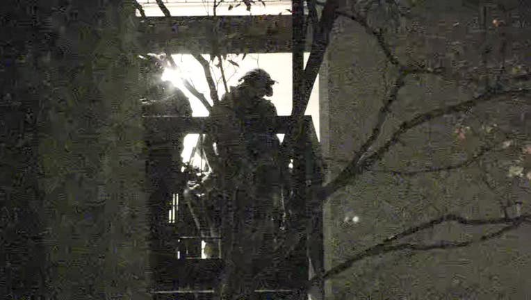 A SWAT team surrounds a Marietta apartment with a suspect barricaded inside on Oct. 13, 2022.