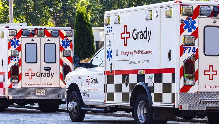 A Grady ambulance sits outside a hospita;l