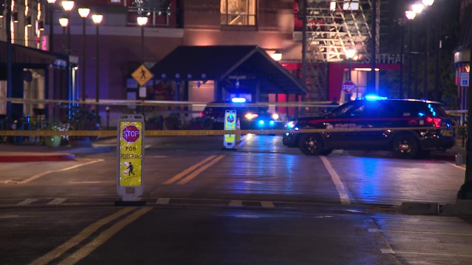 Police investigate a shooting outside the movie theater at Atlantic Station in Atlanta on Oct. 8, 2022.