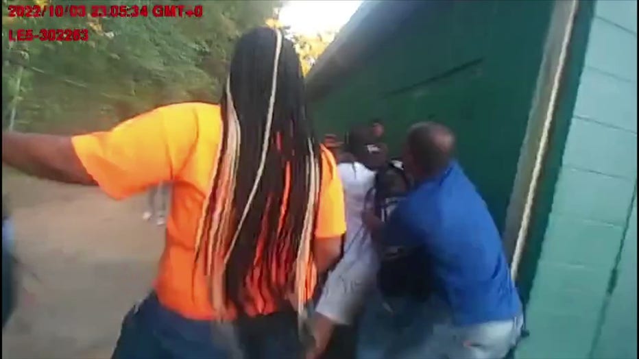 Hoganville police released this image from body camera video showing a fight at a youth football game in Troup County on Oct. 3, 2022.