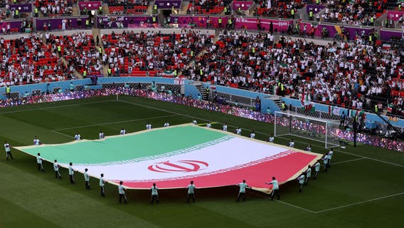 US soccer briefly scrubs emblem from Iran flag at World Cup