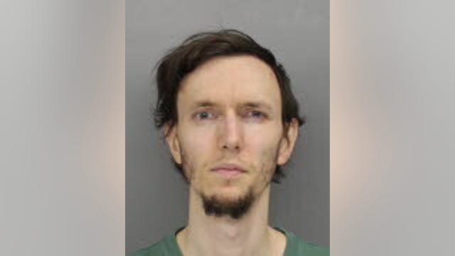 Warrant: Man recorded video of polling machines, slapped Cobb County voter