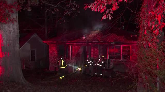 Firefighters rescue unconscious man trapped in burning SW Atlanta home