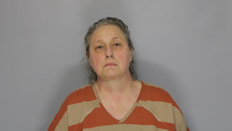 Fonda Spratt, charged with attempted murder in Flowery Branch after alleged dispute over barking dog.