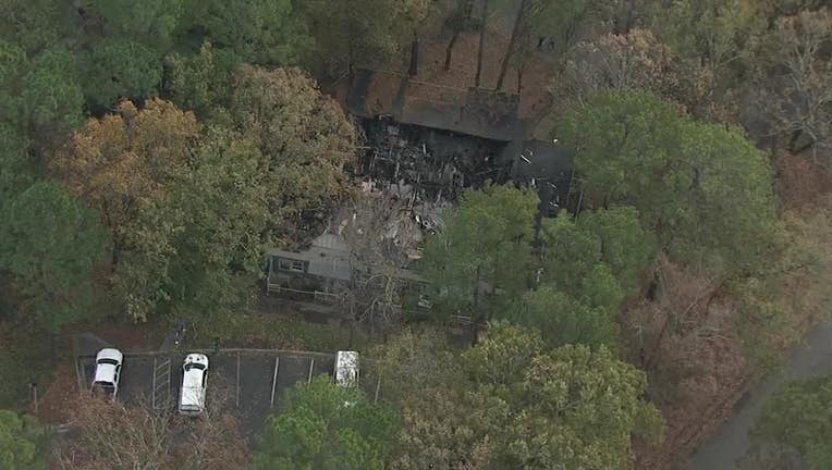 SKYFOX flies over a burned apartment building on Paces Walk.