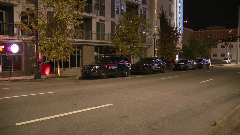 Police investigate shooting on Spring Street in Midtown Atlanta.