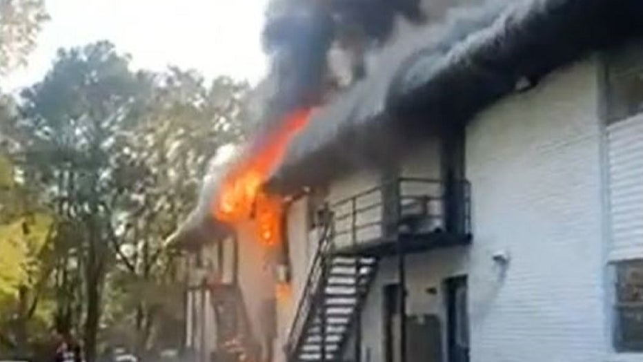 East Point firefighters battle a deadly apartment fire on Nov. 23, 2022.