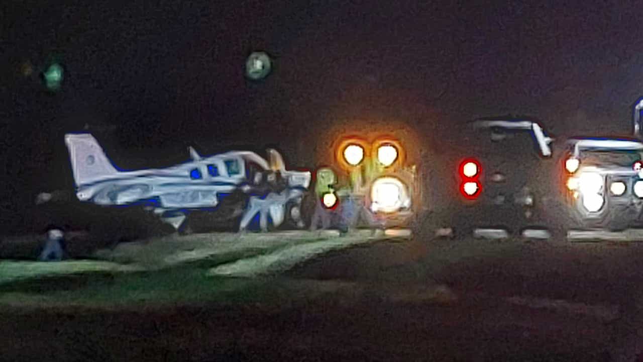 Small plane crashes into car during emergency landing in North
