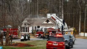Firefighters team up to battle house fire in southeast Cherokee County