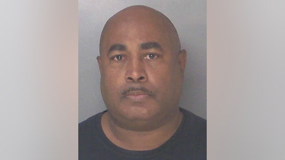 Grady Hospital officer arrested for shooting at driver on I-20 while in uniform, deputies say