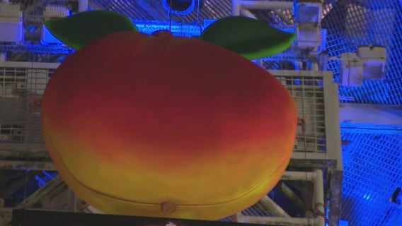 Crowd anxiously awaits the Peach Drop countdown