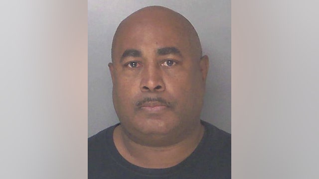 Grady Hospital officer arrested for shooting at driver on I-20 while in uniform, deputies say