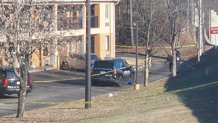 DeKalb County police investigate a double shooting at a motel on Dec. 28, 2022.