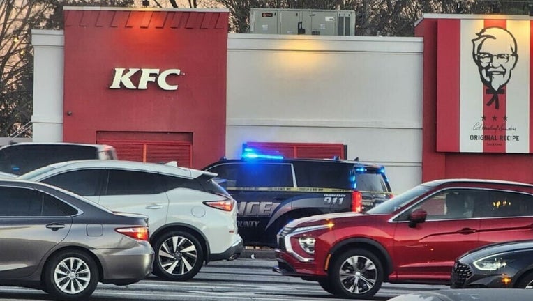 Police say they are investigating a shootout at a popular chicken fast-food restaurant in DeKalb County on Dec. 29, 2022.