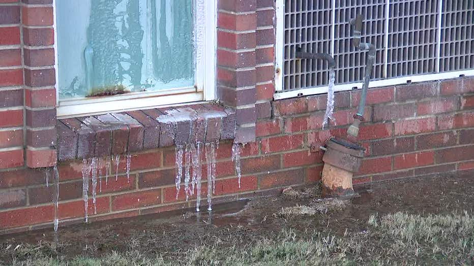 Water flooding Morrow High School froze on Dec. 26, 2022 after pipes burst due to days of temperatures below freezing.
