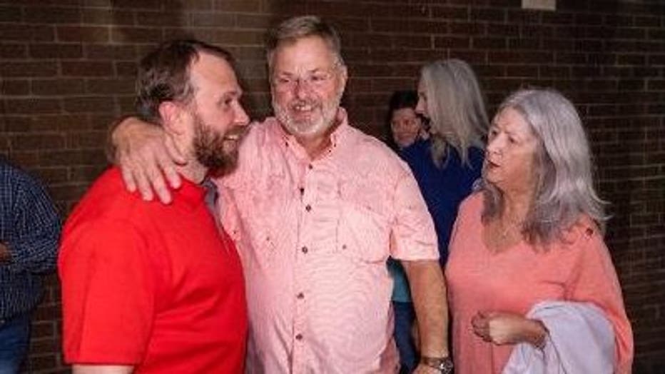 Lee Clark with his family after being released from prison on Dec. 8, 2022.