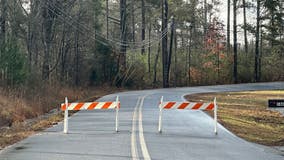 Adairsville authorities close road to repair power lines