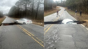 Washed out road swallows car in Clarke County