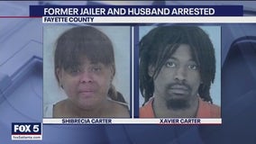 Georgia jail officer accused of buying guns for husband, a convicted felon