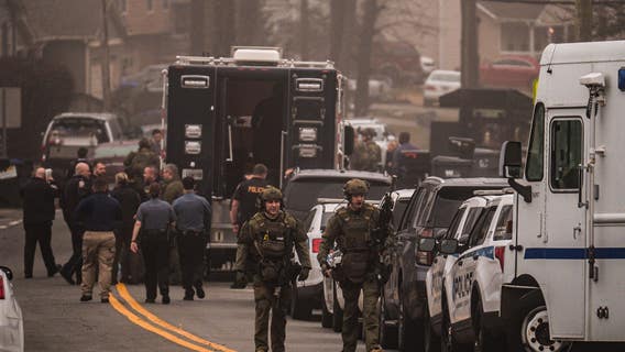 Man wanted for kidnapping 10-year-old girl found dead after SWAT standoff, police say