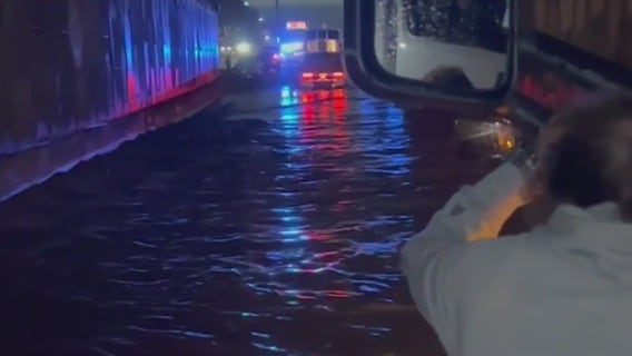 Woman trapped for hours after car stalls on flooded I-85