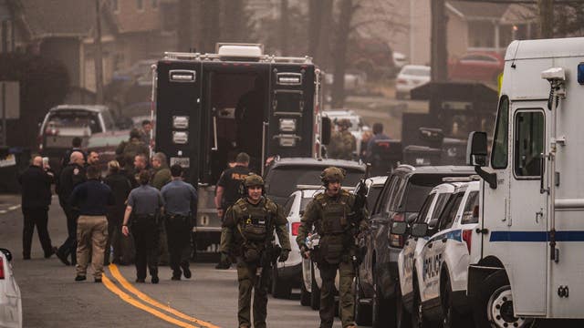 Man wanted for kidnapping 10-year-old girl found dead after SWAT standoff, police say