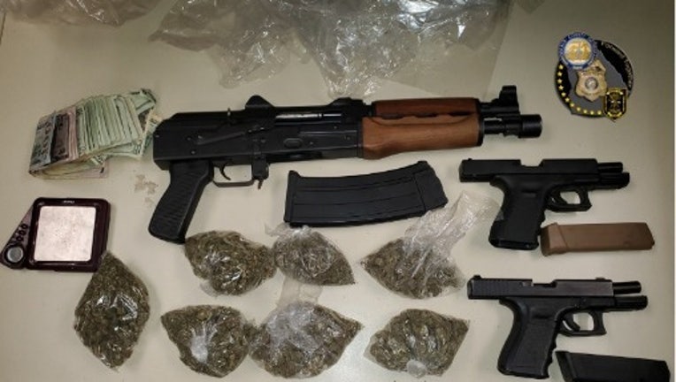 Guns and marijuana were seized during a DeKalb County criminal investigation on Dec. 29, 2022.