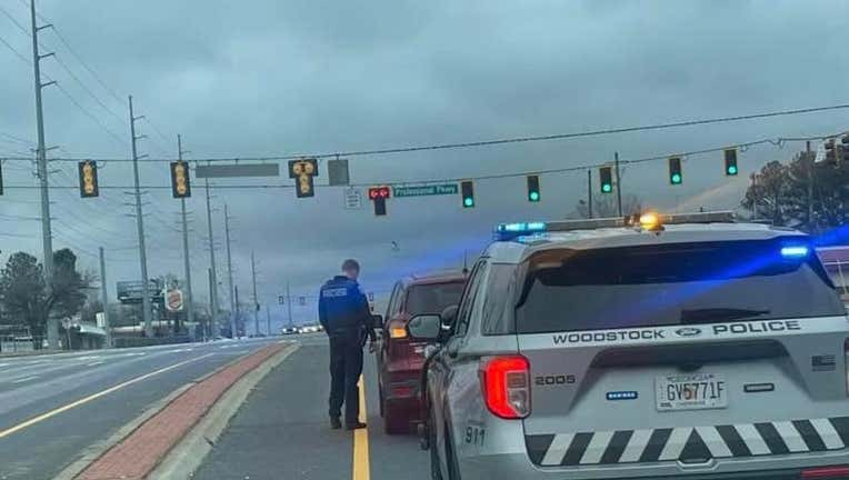 A citizen thanked a Woodstock Officer B. Keane who used his patrol car to push a stranded woman before he physically pushed it to the station.