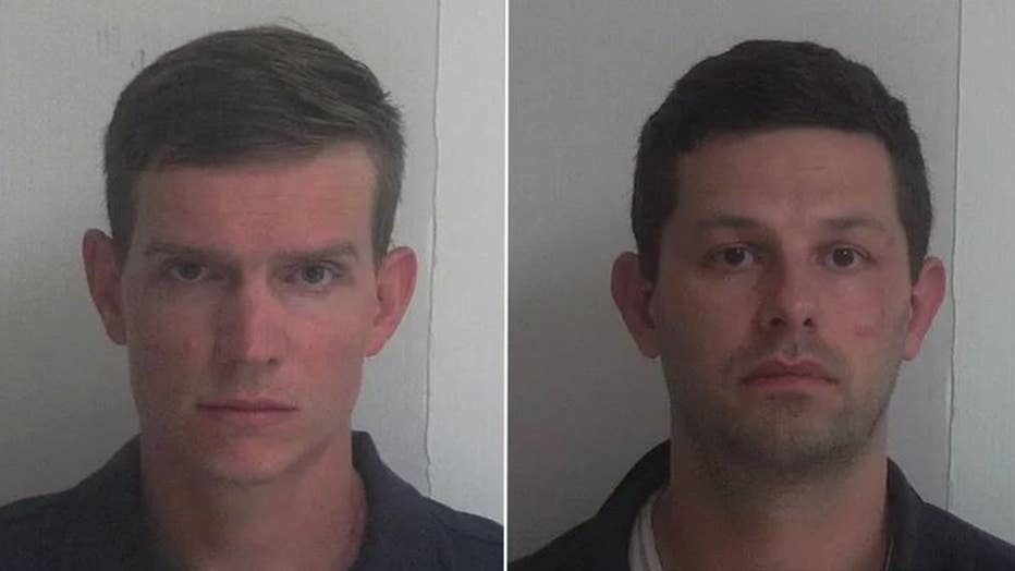 Zachary Zulock and William Zulock were arrested on July 27 in Oxford, Georgia, after police raided their home and found video evidence that they were "engaging in sexually abusive acts" with the adopted children. (Walton County Sheriff's Office)