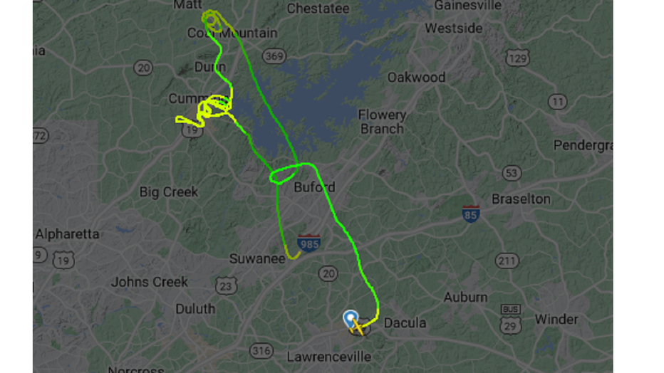 An image provided by flightaware.com shows the path a plane took before making an emergency landing along I-985 in Gwinnett County on Jan. 24, 2023.