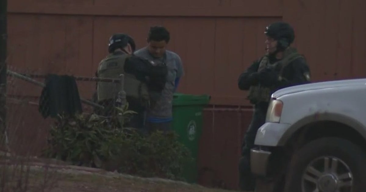 Armed man arrested after barricading himself inside home in Doraville ...