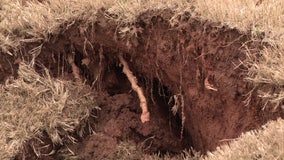 Stone Mountain neighbor says sinkhole has been growing for weeks