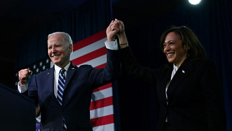 US Vice President Kamala Harris and US President Joe Biden hold hands at the Democratic National Committee (DNC) 2023 Winter meeting in Philadelphia, Pennsylvania, on February 3, 2023. - The DNC on February 4, 2023, is expected to approve a new lineup for the partys presidential primaries. (Photo by ANDREW CABALLERO-REYNOLDS / AFP) (Photo by ANDREW CABALLERO-REYNOLDS/AFP via Getty Images)
