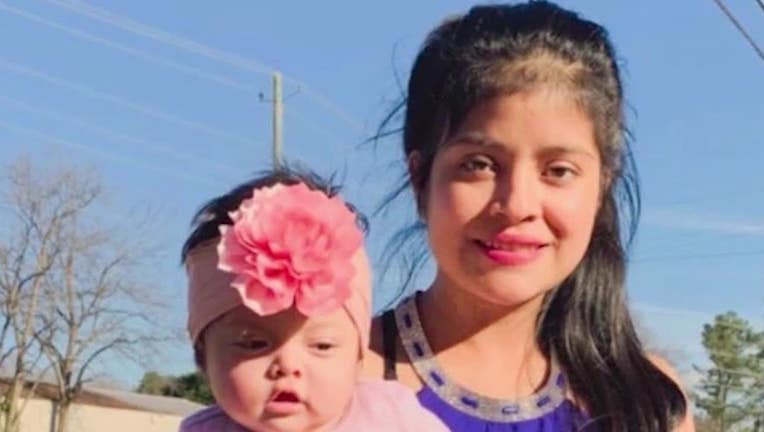 Juana Jose poses with her daughter