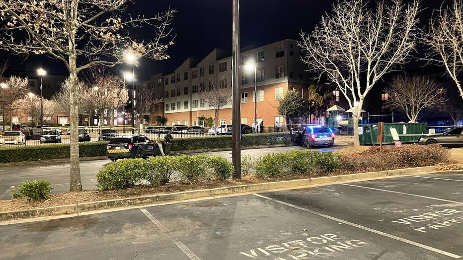 Police tape surrounds the playground of the Parkside at Mechanicsville apartments located along McDaniel Street SW after two children were shot on Feb. 22, 2023.