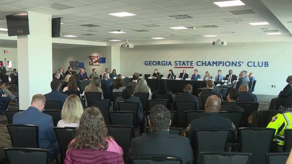 Law enforcement officials host Georgia Gov. Brian Kemp and Attorney General Chris Carr during a Georgia Anti-Gang Network meeting in Atlanta on Jan. 7, 2023.