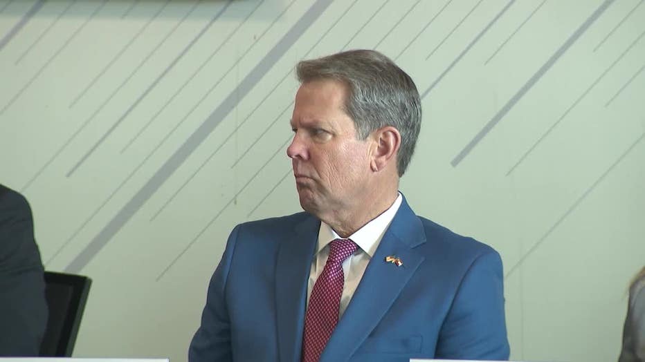 Georgia Gov. Brian Kemp listens to law enforcement officials during a Georgia Anti-Gang Network meeting in Atlanta on Jan. 7, 2023.