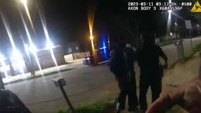 Video: Police arrest armed man donned in body armor after rifle shots fired into home