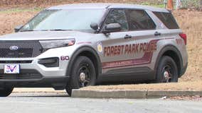 Police vehicle struck by dump truck in Forest Park crash