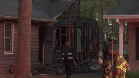 2 women rescued from burning Tucker home